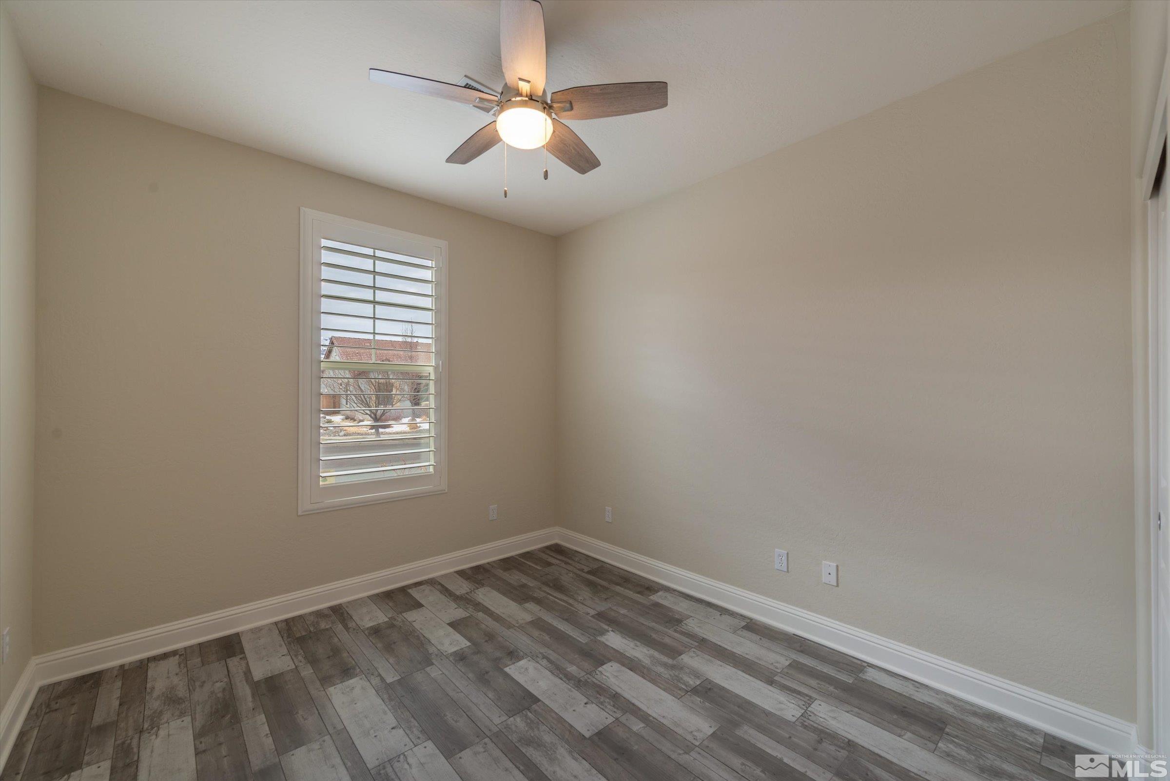 9125 Heritage Ridge Court Reno, NV 89523 - Photo 20 of 40 an empty room with a window