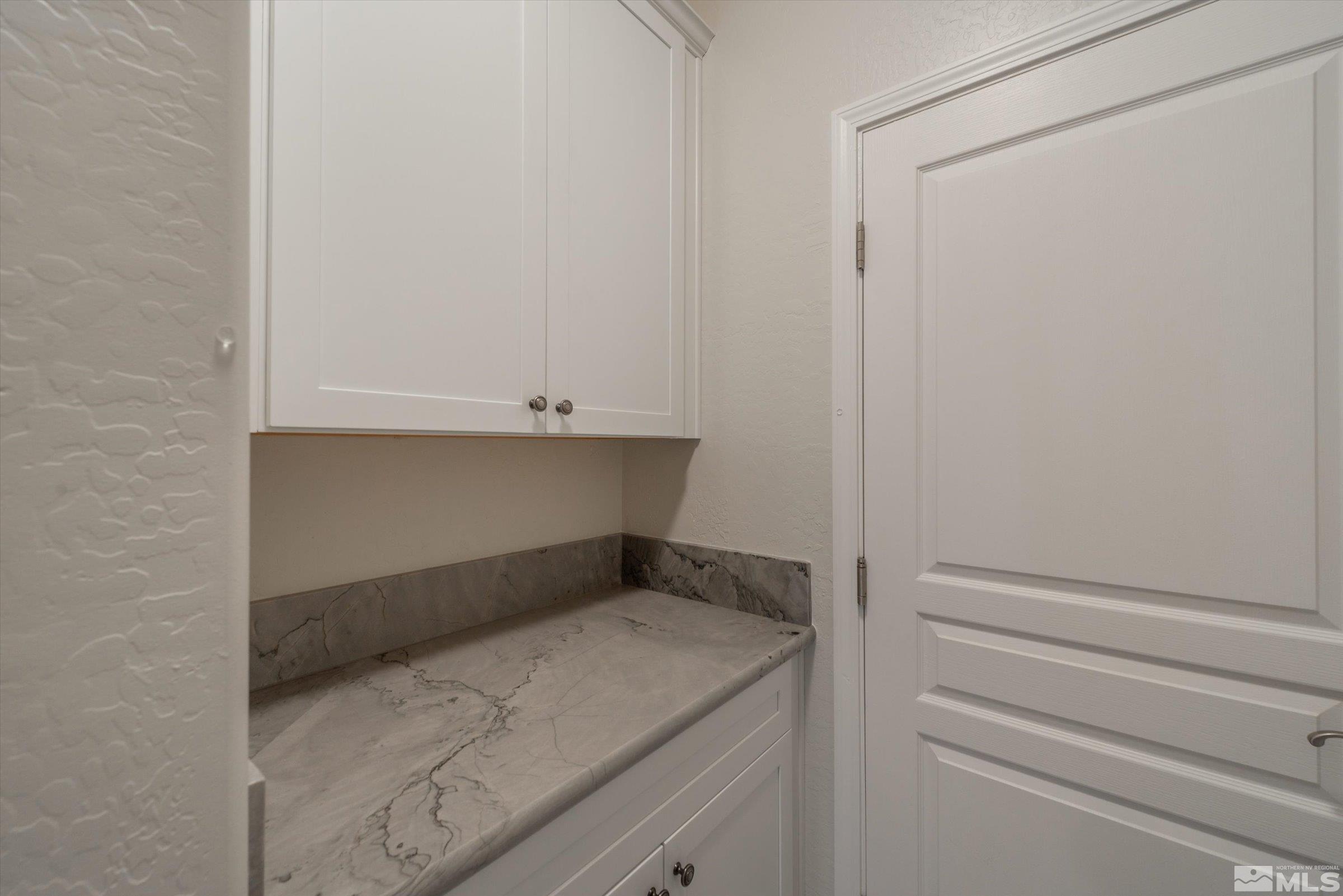 9125 Heritage Ridge Court Reno, NV 89523 - Photo 27 of 40 a utility room with dryer and washer