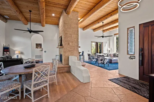 a dining room with furniture and window