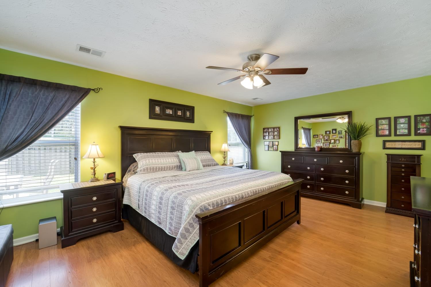 3957 Stephens Ridge Way Antioch, TN 37013 - Photo 10 of 30 a bedroom with a bed and a chandelier
