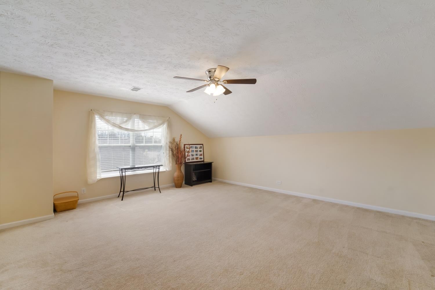 3957 Stephens Ridge Way Antioch, TN 37013 - Photo 16 of 30 an empty room with windows and ceiling fan view