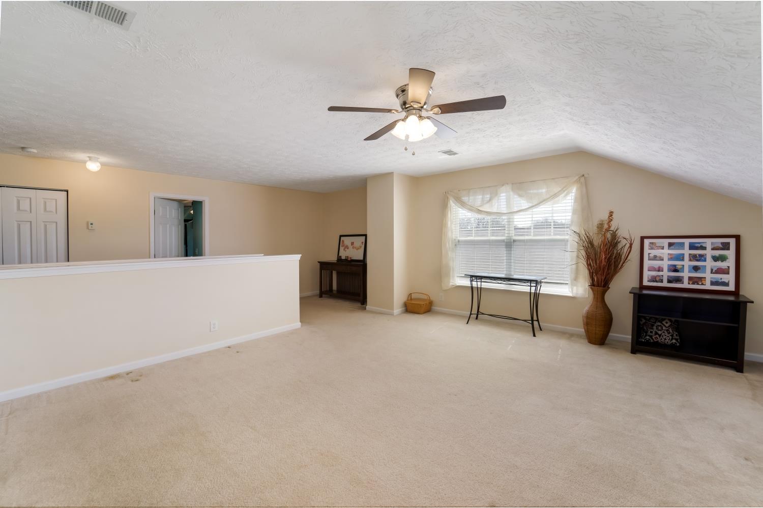 3957 Stephens Ridge Way Antioch, TN 37013 - Photo 17 of 30 a view of a livingroom with a ceiling fan and window