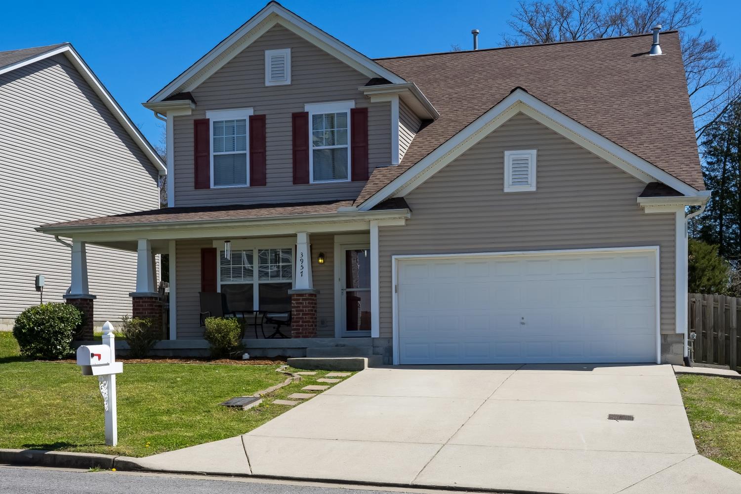 3957 Stephens Ridge Way Antioch, TN 37013 - Photo 2 of 30 a front view of a house with garden