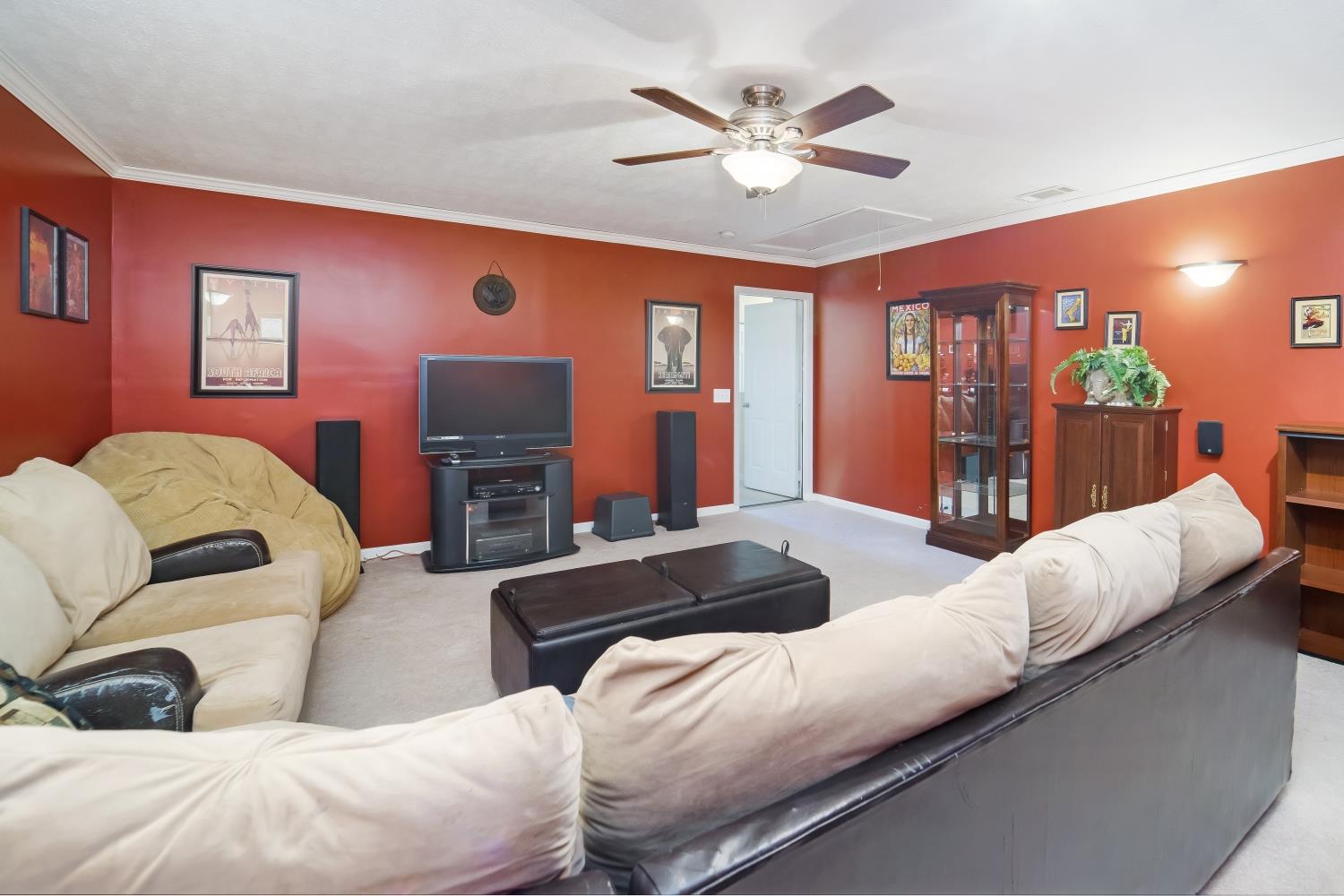 3957 Stephens Ridge Way Antioch, TN 37013 - Photo 24 of 30 a bedroom with a bed ceiling fan and a large mirror