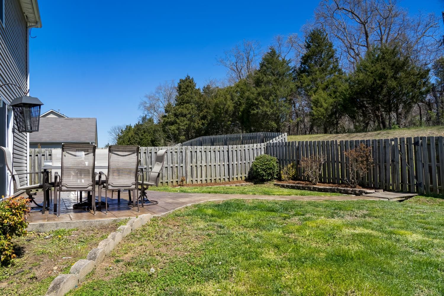 3957 Stephens Ridge Way Antioch, TN 37013 - Photo 26 of 30 a view of a chair and table in the patio