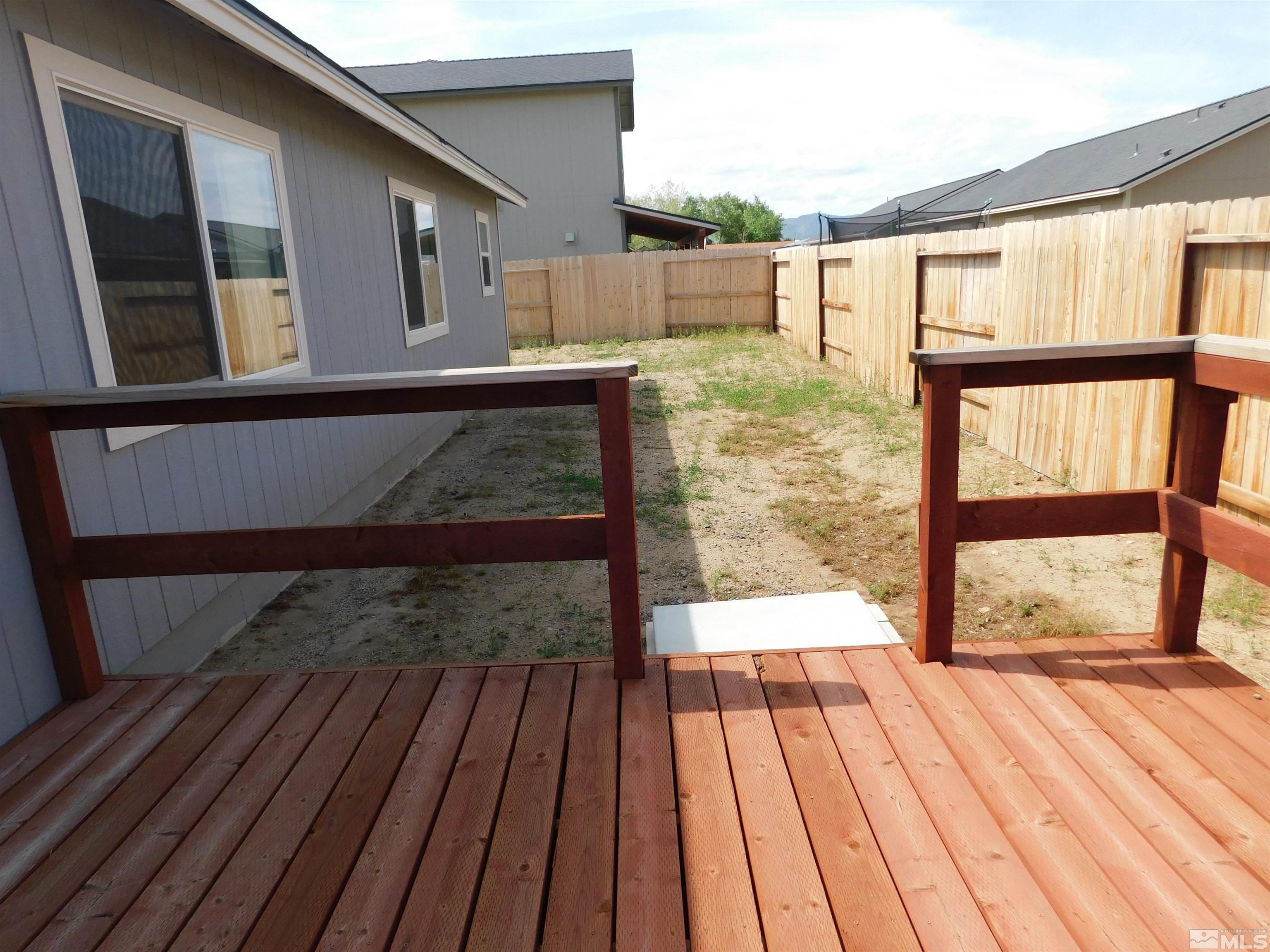 239 Misty Way Dayton, NV 89403 - Photo 12 of 29 a view of a balcony with wooden floor
