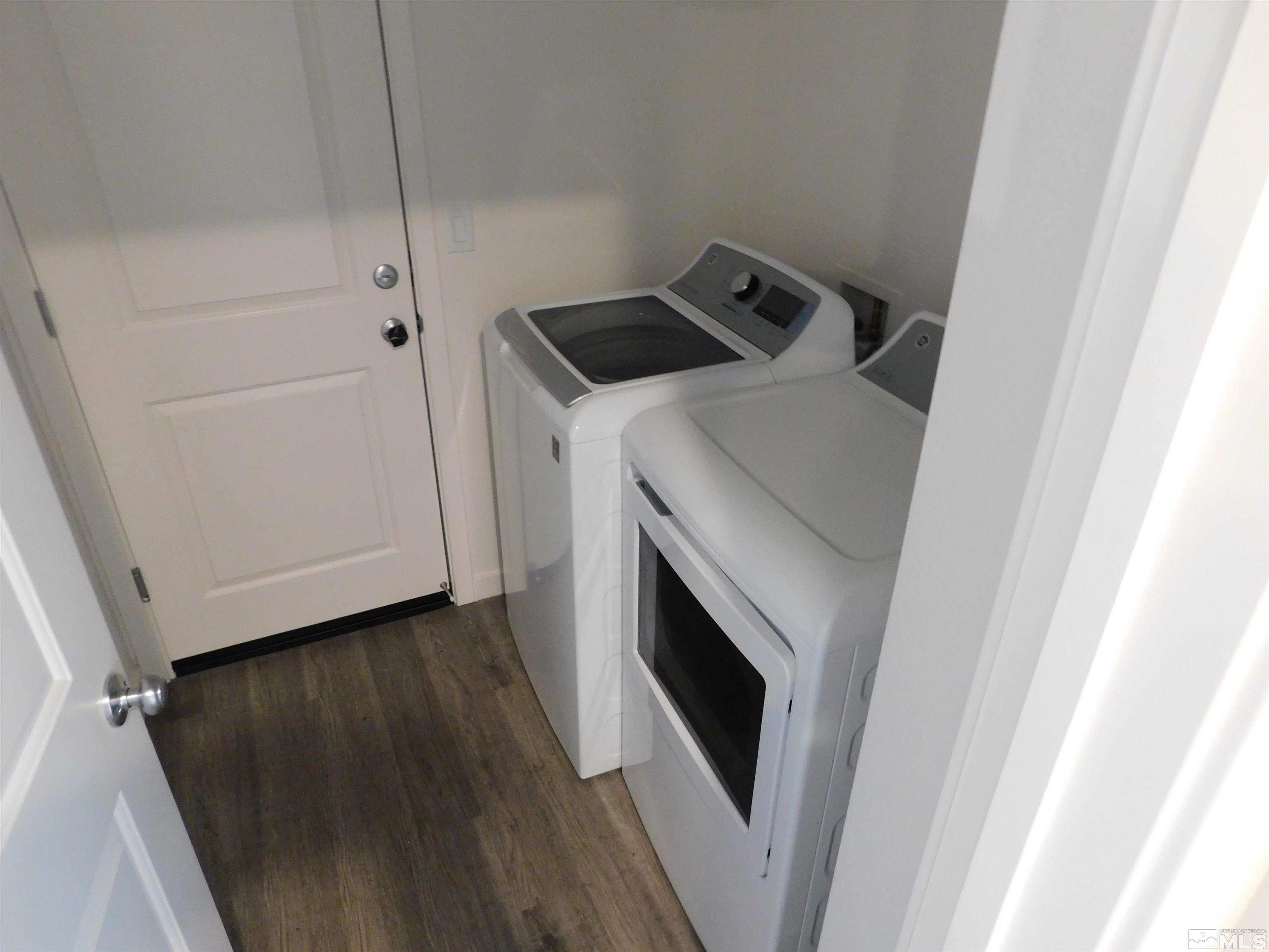 239 Misty Way Dayton, NV 89403 - Photo 16 of 29 a utility room with dryer and washer