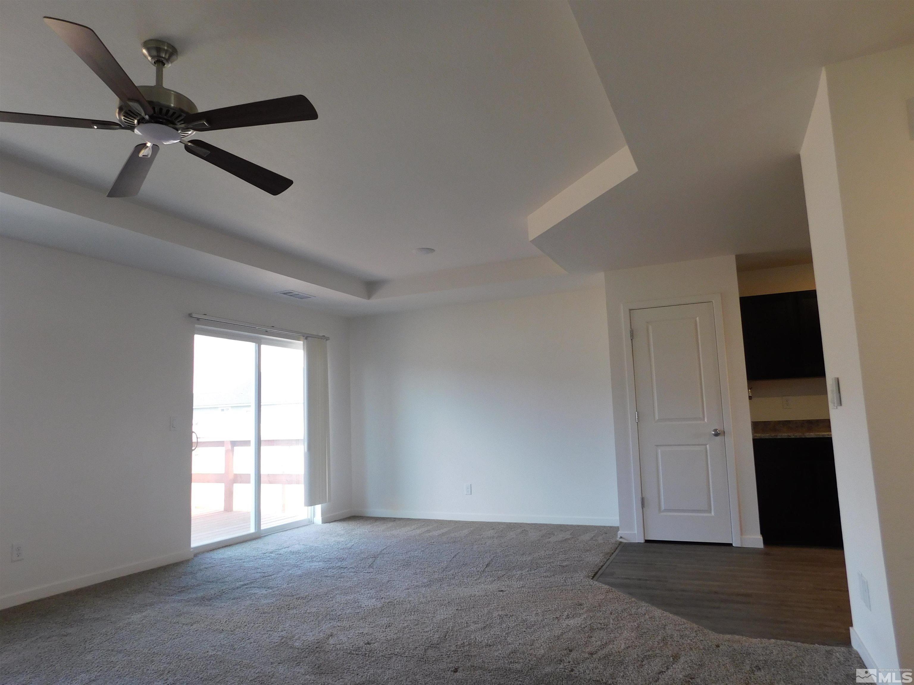 239 Misty Way Dayton, NV 89403 - Photo 22 of 29 an empty room with windows
