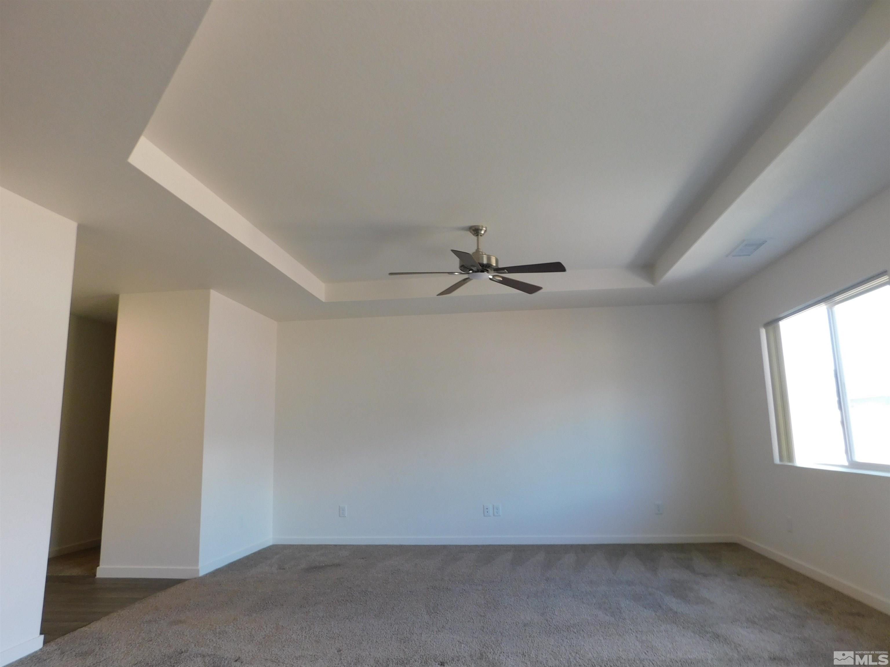 239 Misty Way Dayton, NV 89403 - Photo 5 of 29 an empty room with a window