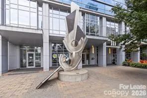 a view of a house with large windows