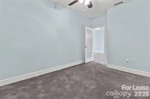 an empty room with a bathroom