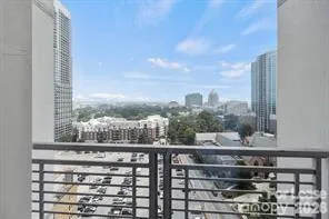 a view of a balcony with city view