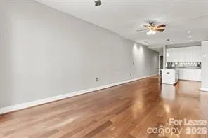 a view of a kitchen with a dishwasher and a refrigerator