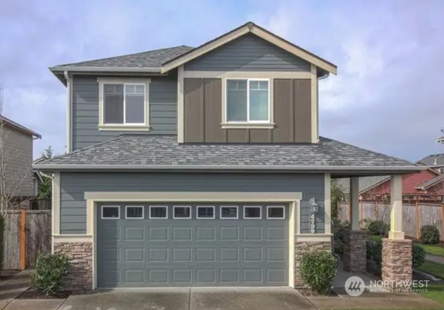 4739 Rochelle Street Southeast Lacey, WA 98503 - Photo 1 of 1 a front view of a house with garden