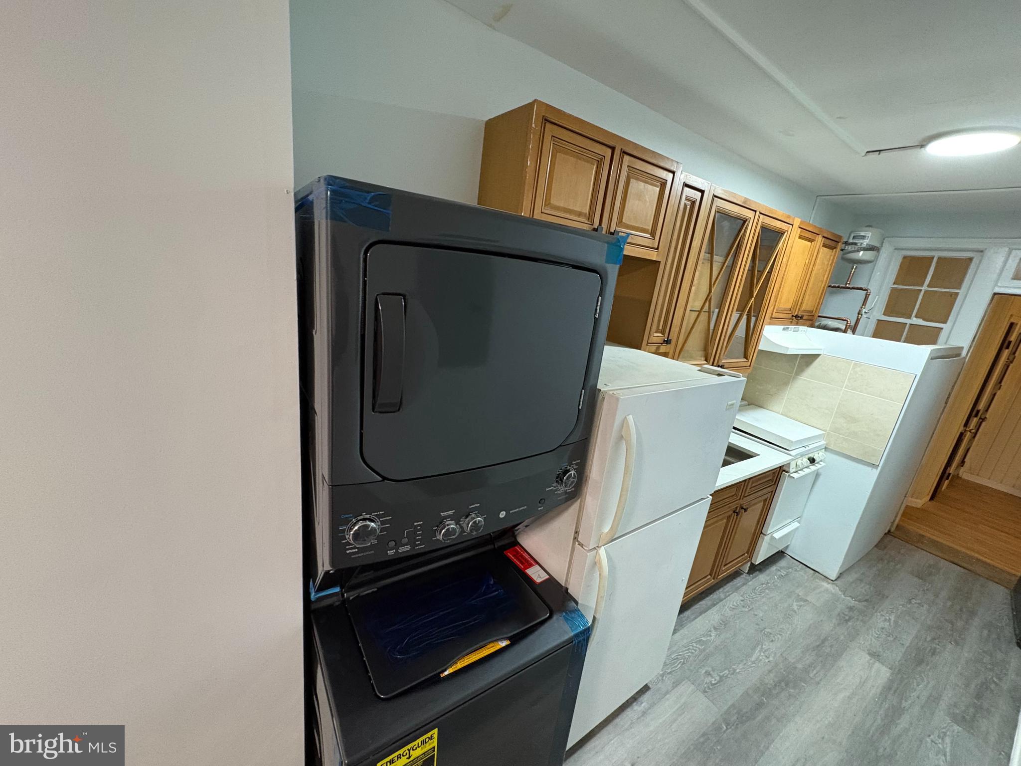 165 35th Street Northeast, Unit 2 Washington, DC 20019 - Photo 5 of 12 a utility room with dryer and washer