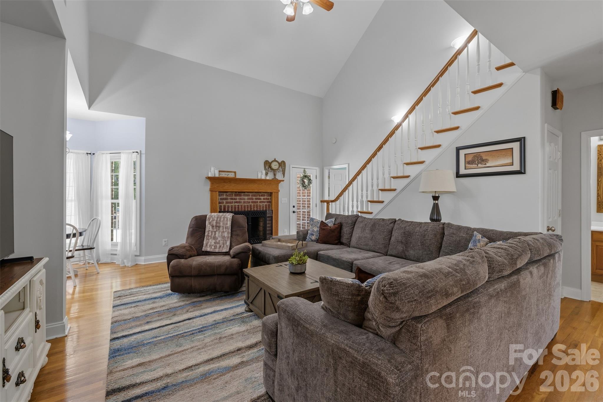 710 Sleepy Hollow Road Midland, NC 28107 - Photo 7 of 29 a living room with furniture and a fireplace