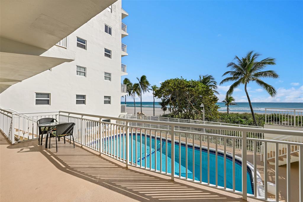901 South Surf Road, Unit 203 Hollywood, FL 33019 - Photo 20 of 23 a view of a balcony with outdoor seating