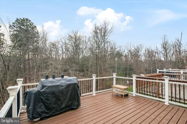 a view of a balcony with furniture