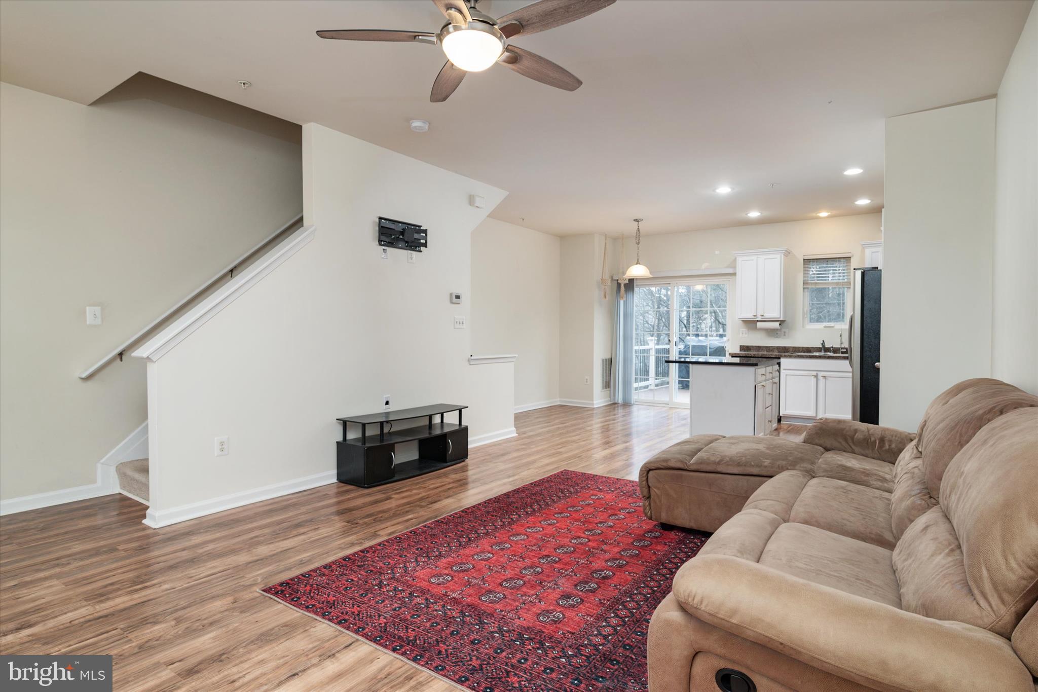 1013 Sithean Way Glen Burnie, MD 21060 - Photo 15 of 35 a living room with furniture and a wooden floor