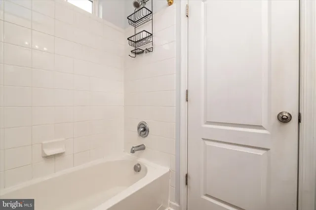 a bathroom with a bathtub