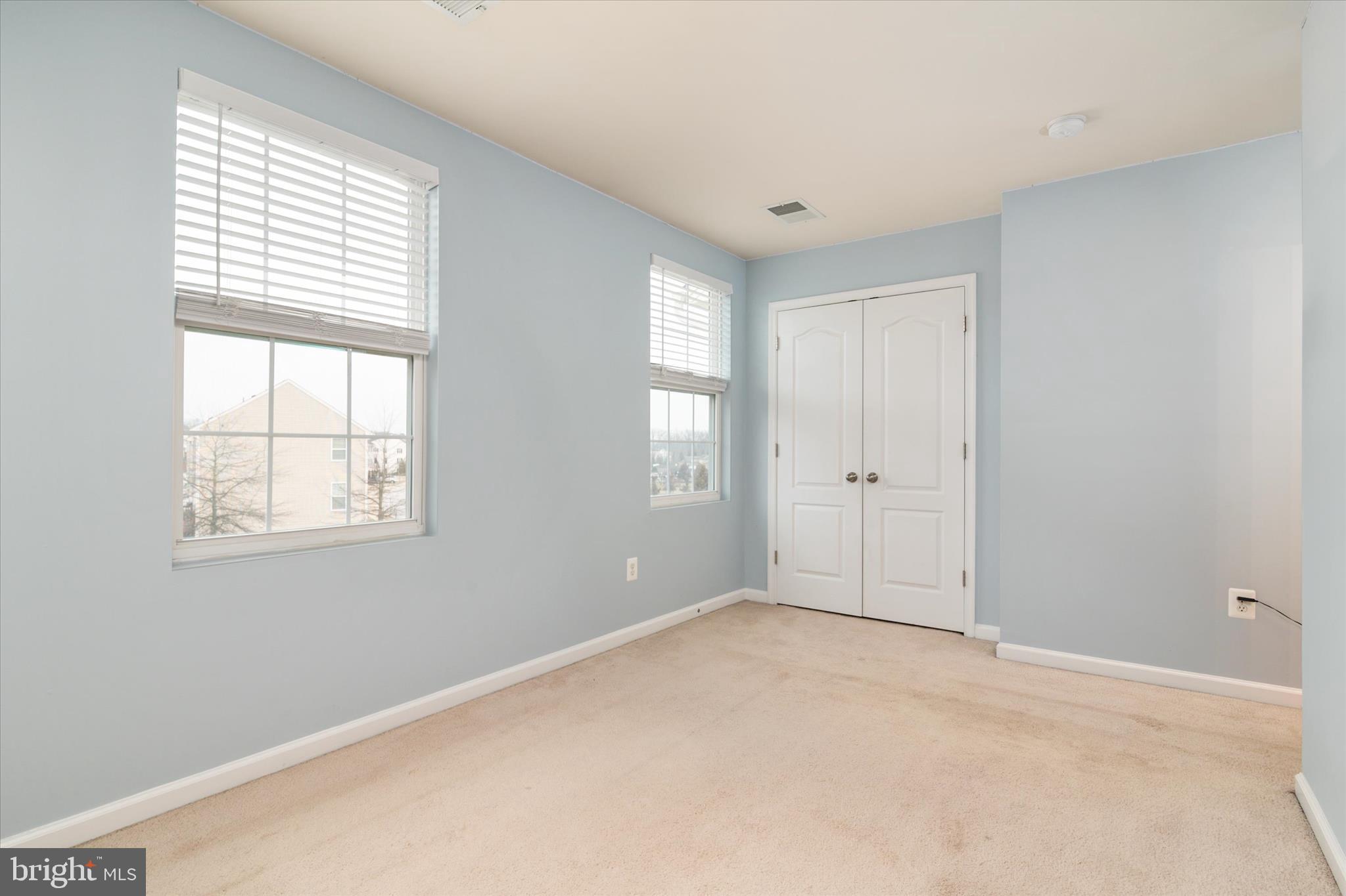 1013 Sithean Way Glen Burnie, MD 21060 - Photo 22 of 35 a view of an empty room with a window
