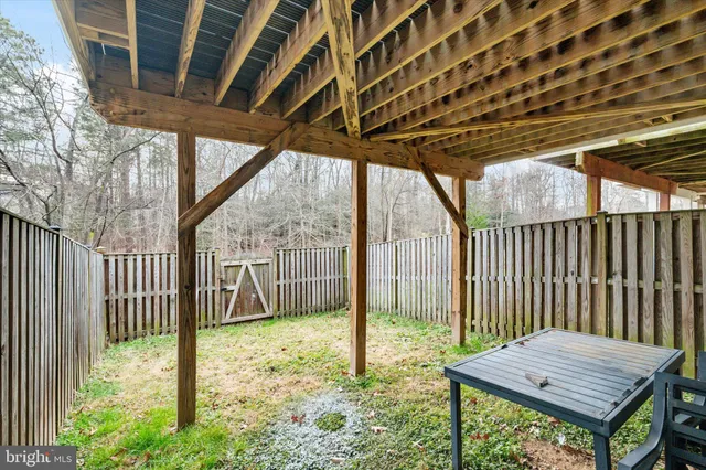 a view of a cafe with sitting area