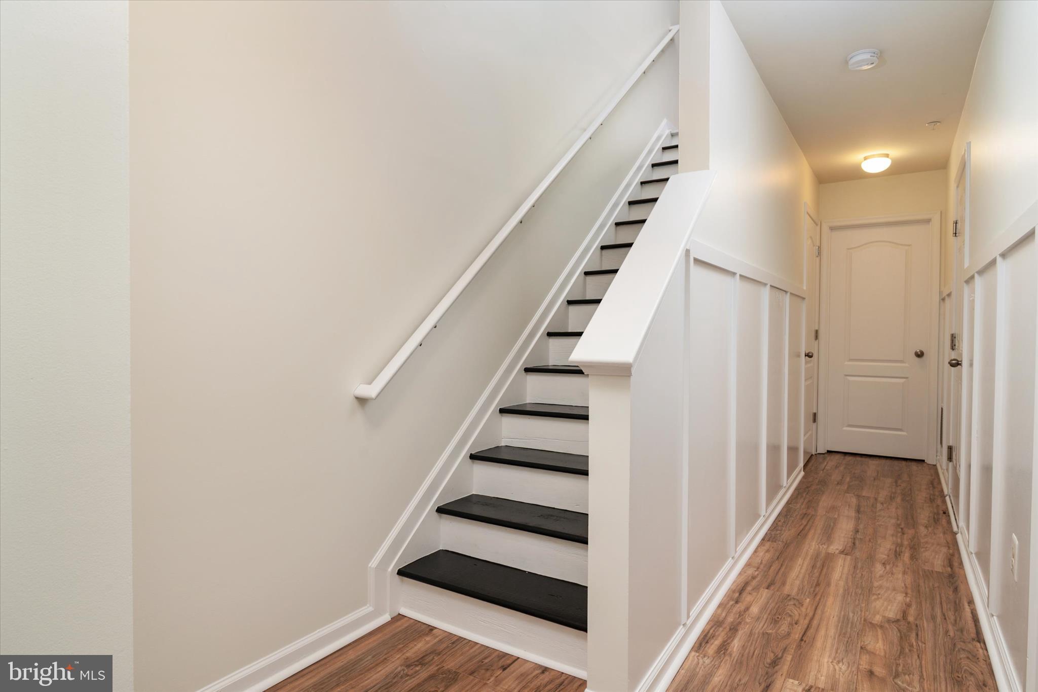 1013 Sithean Way Glen Burnie, MD 21060 - Photo 4 of 35 a view of entryway with wooden floor