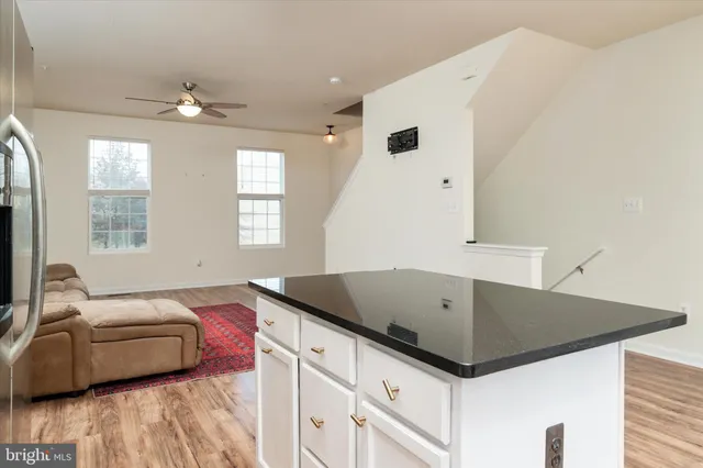 a living room with furniture and window