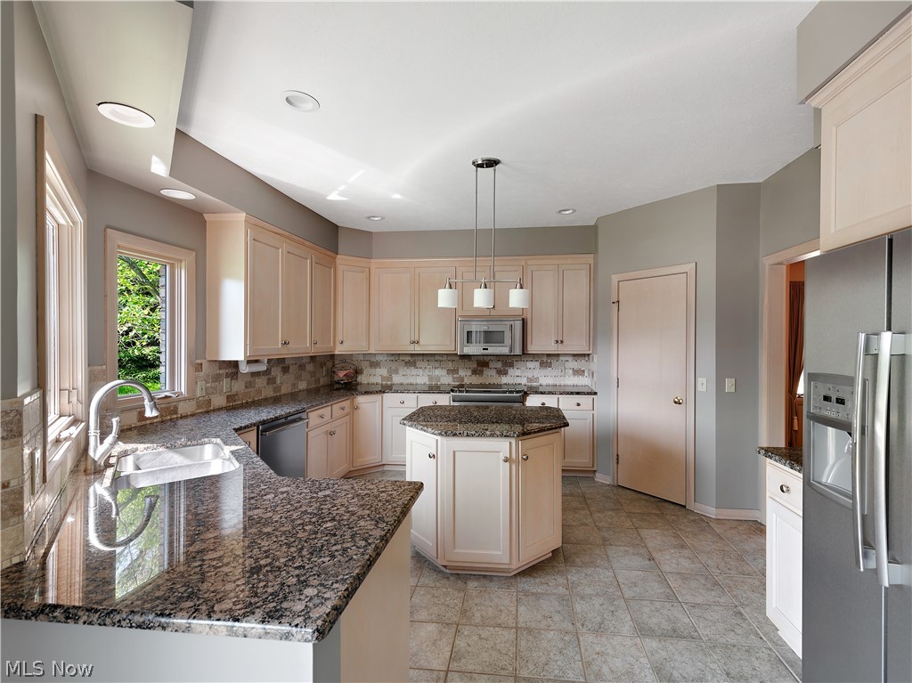 6137 Isley Road Northwest Canton, OH 44718 - Photo 13 of 35 Granite Counter tops and stainless steel countertops