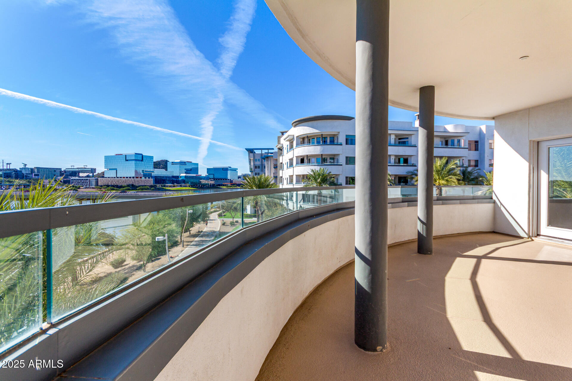 945 East Playa Del Norte Drive, Unit 3013 Tempe, AZ 85288 - Photo 2 of 36 a view of swimming pool from a balcony