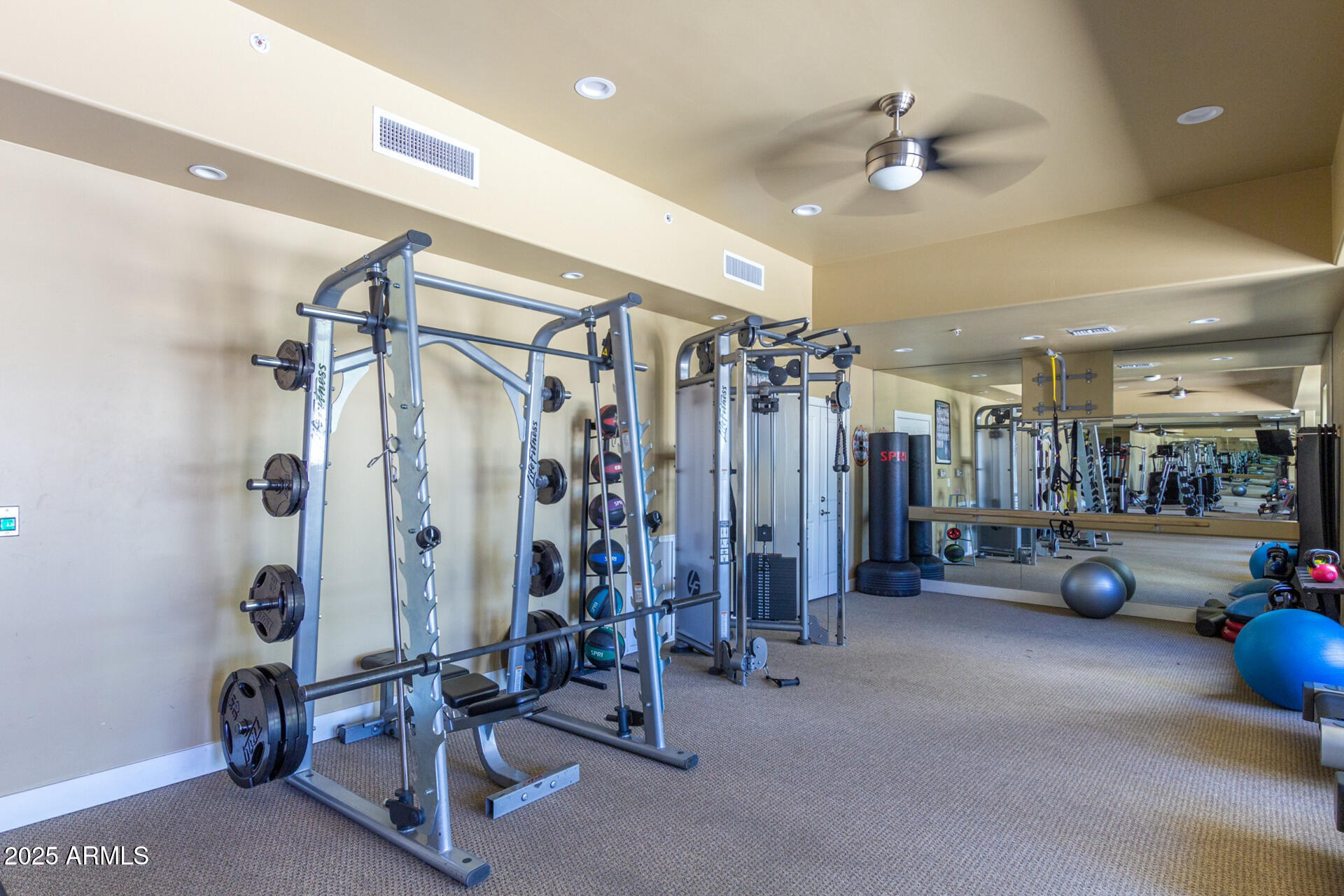 945 East Playa Del Norte Drive, Unit 3013 Tempe, AZ 85288 - Photo 29 of 36 a view of a room with gym equipment