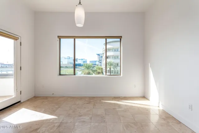 an empty room with windows