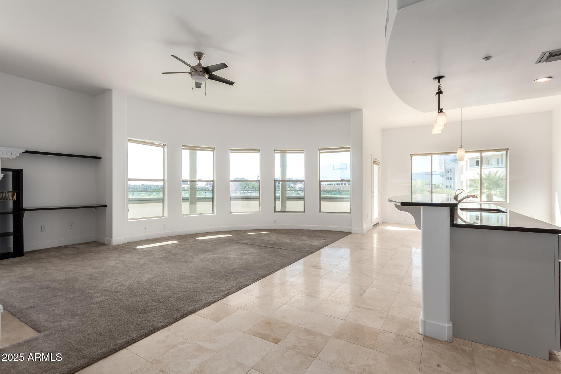 945 East Playa Del Norte Drive, Unit 3013 Tempe, AZ 85288 - Photo 9 of 36 a view of an empty room with a window