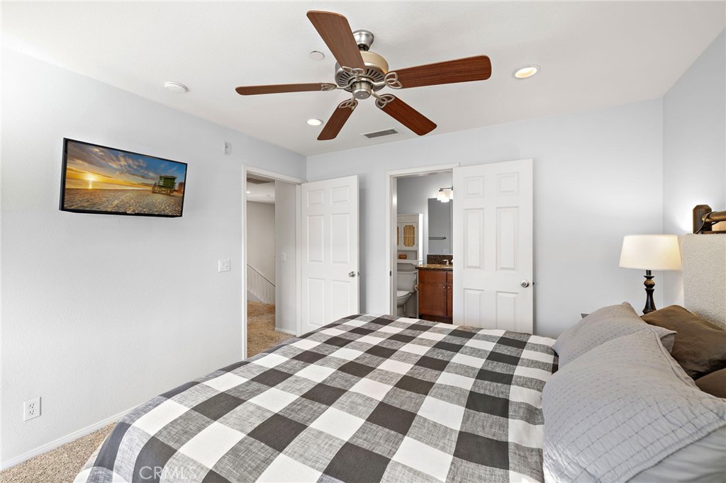 73 Platinum Circle Ladera Ranch, CA 92694 - Photo 11 of 28 a bedroom with a bed and a painting on the wall