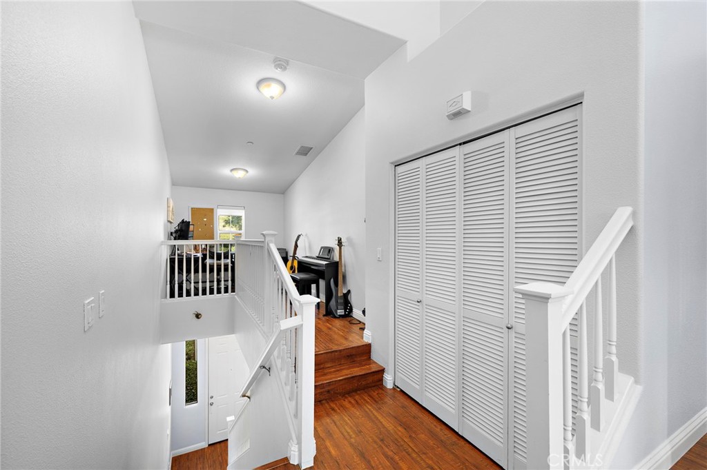 73 Platinum Circle Ladera Ranch, CA 92694 - Photo 16 of 28 a view of entryway and hall with wooden floor