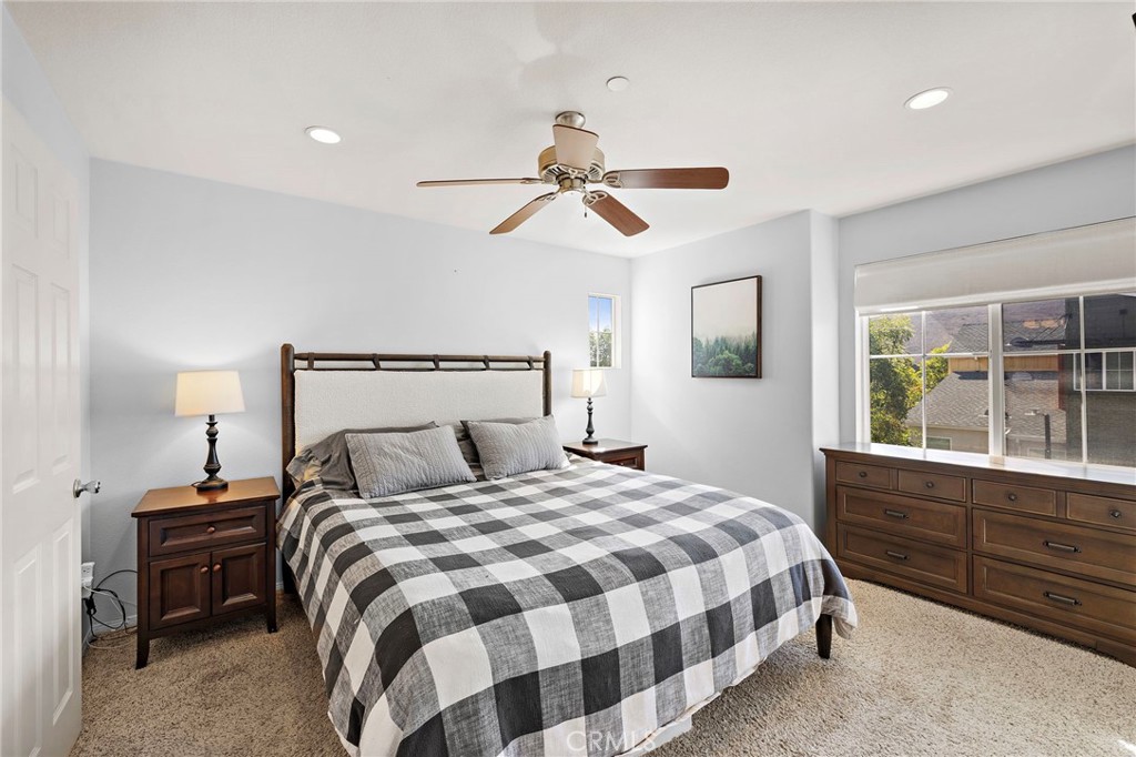 73 Platinum Circle Ladera Ranch, CA 92694 - Photo 10 of 28 a bedroom with a bed and a window