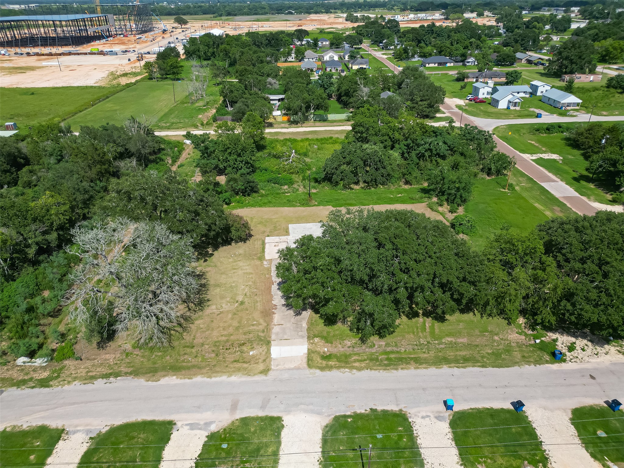 210 5th Street Hempstead, TX 77445 - Photo 16 of 36 a view of a garden with a lake