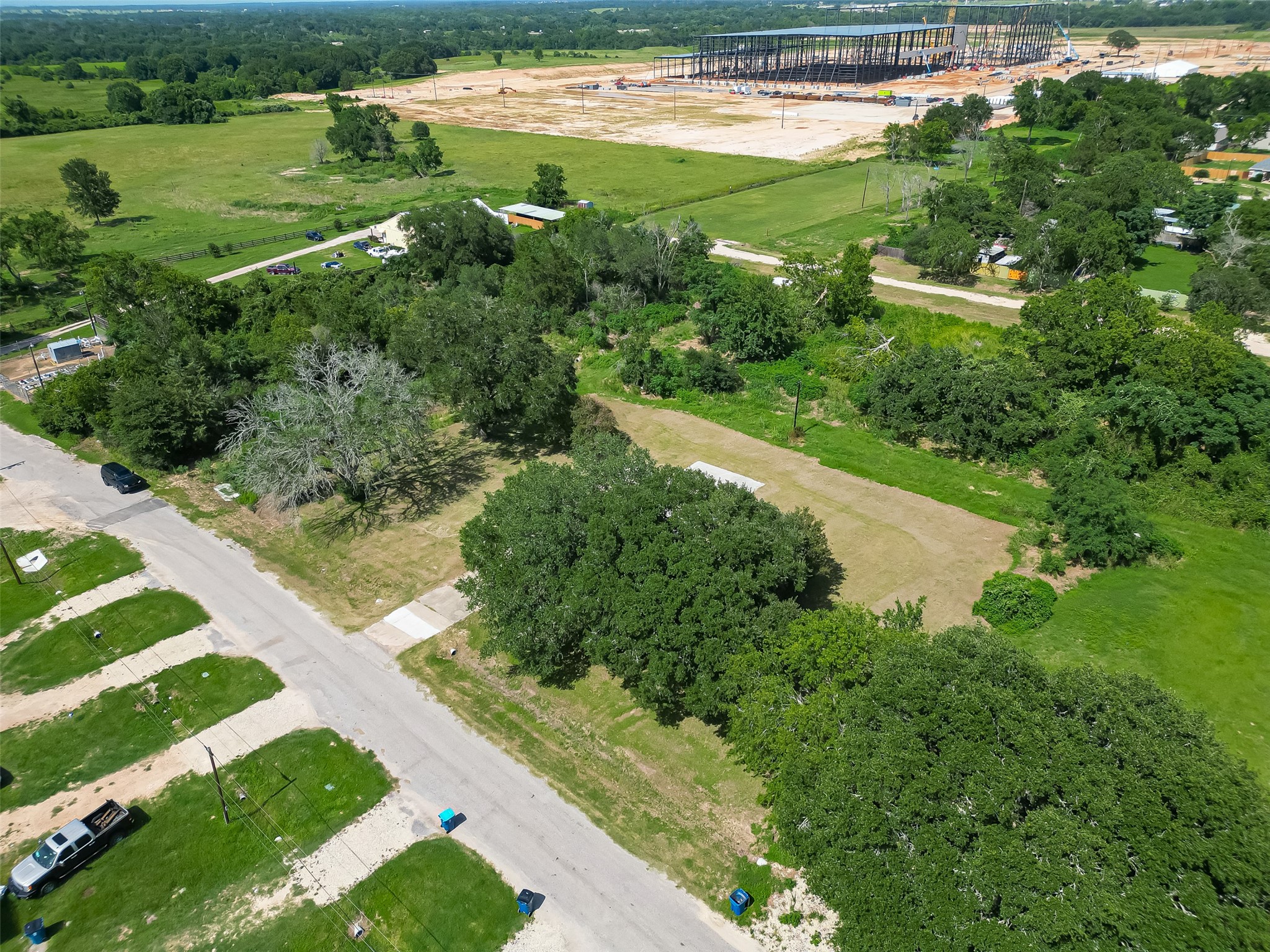 210 5th Street Hempstead, TX 77445 - Photo 21 of 36 a view of a lake with a yard