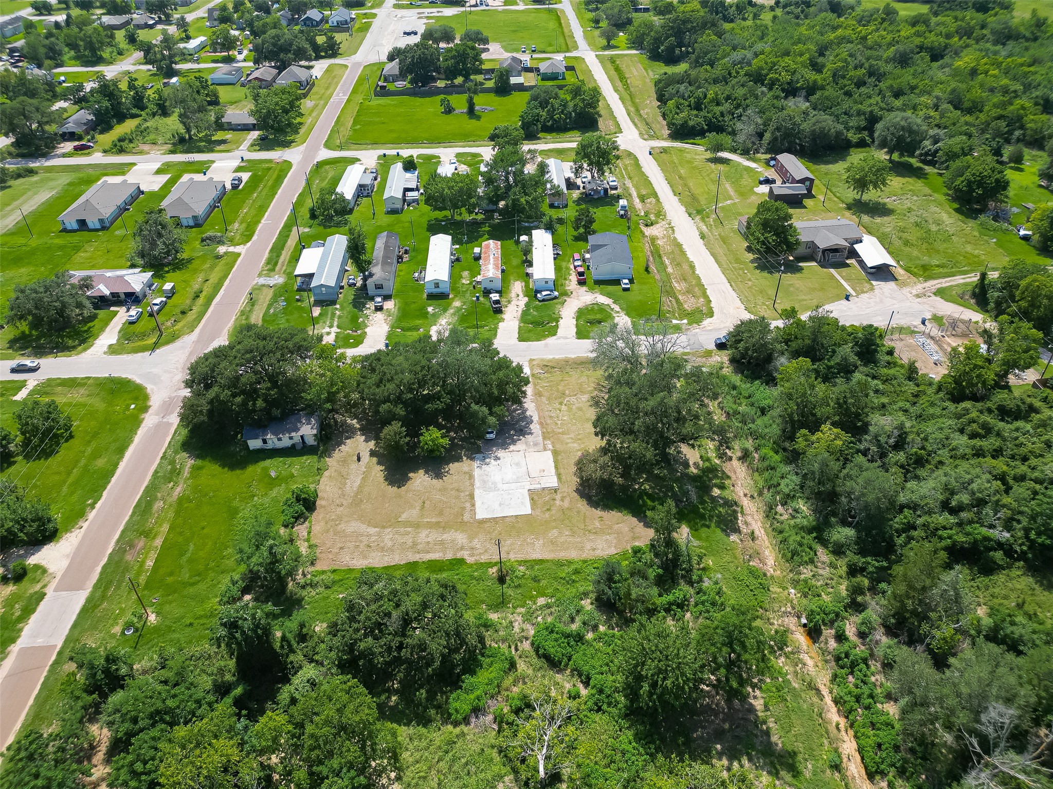 210 5th Street Hempstead, TX 77445 - Photo 25 of 36 an aerial view of a residential houses with outdoor space