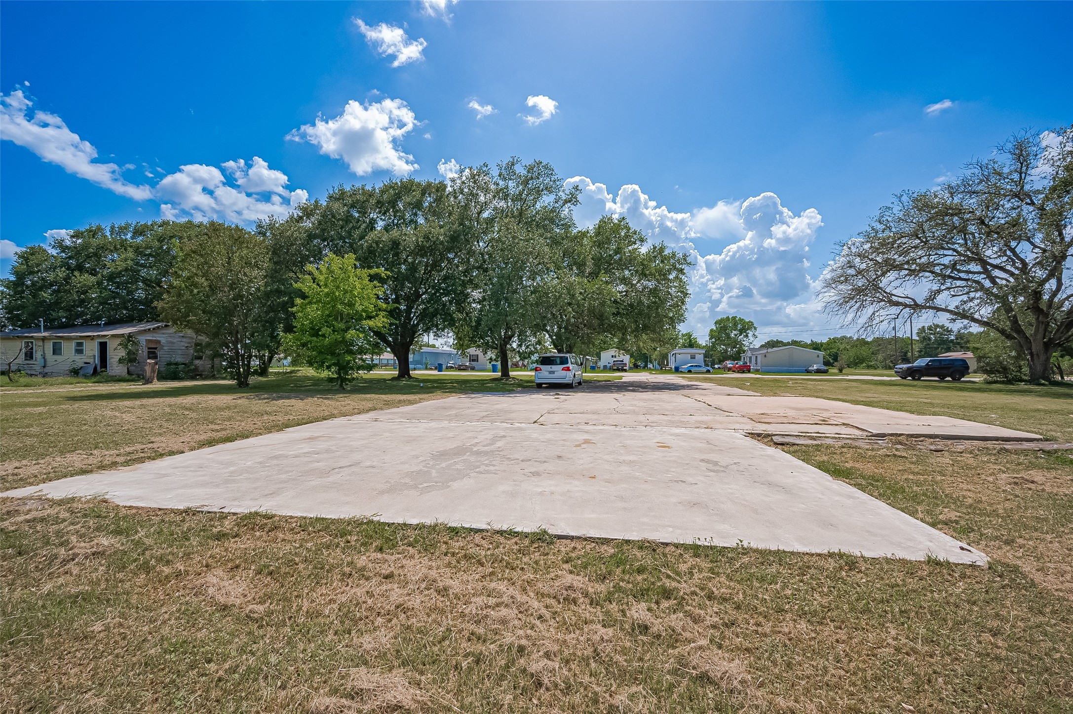 210 5th Street Hempstead, TX 77445 - Photo 8 of 36 a view of road with tree