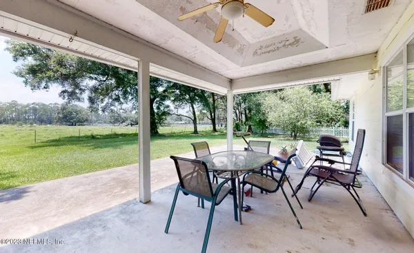 a view of a house with patio