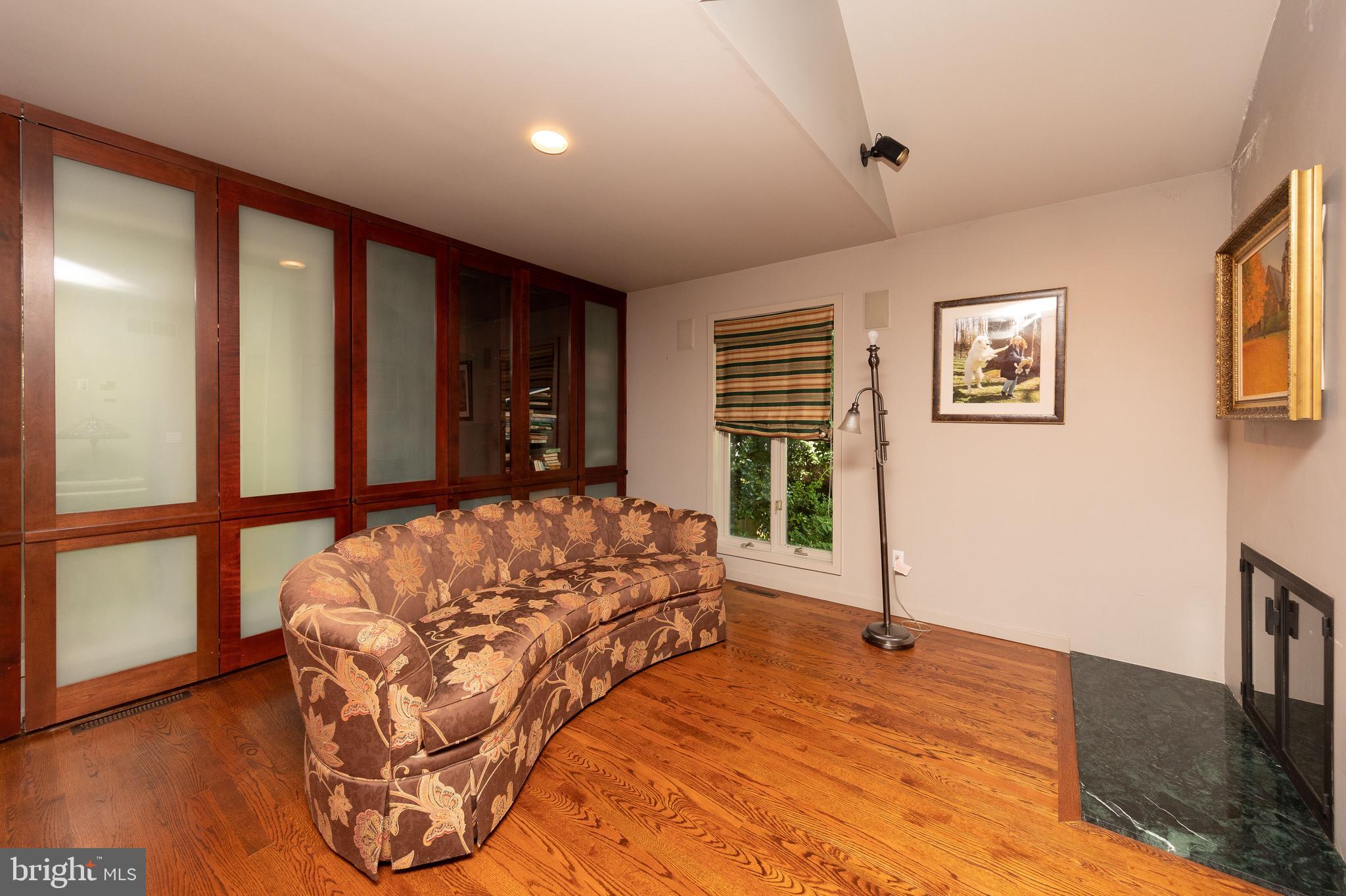 914 Morgan Road Rydal, PA 19046 - Photo 44 of 57 Den with two sided fireplace.