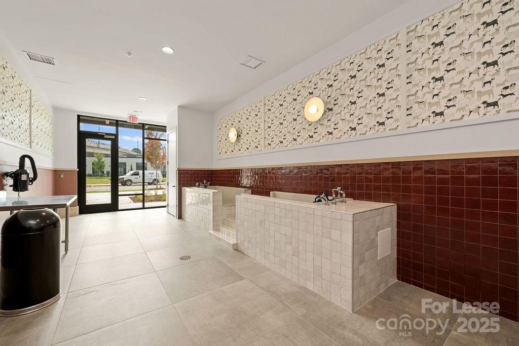 4101 Raleigh Street, Unit B1 Charlotte, NC 28206 - Photo 3 of 48 a living room with a couch