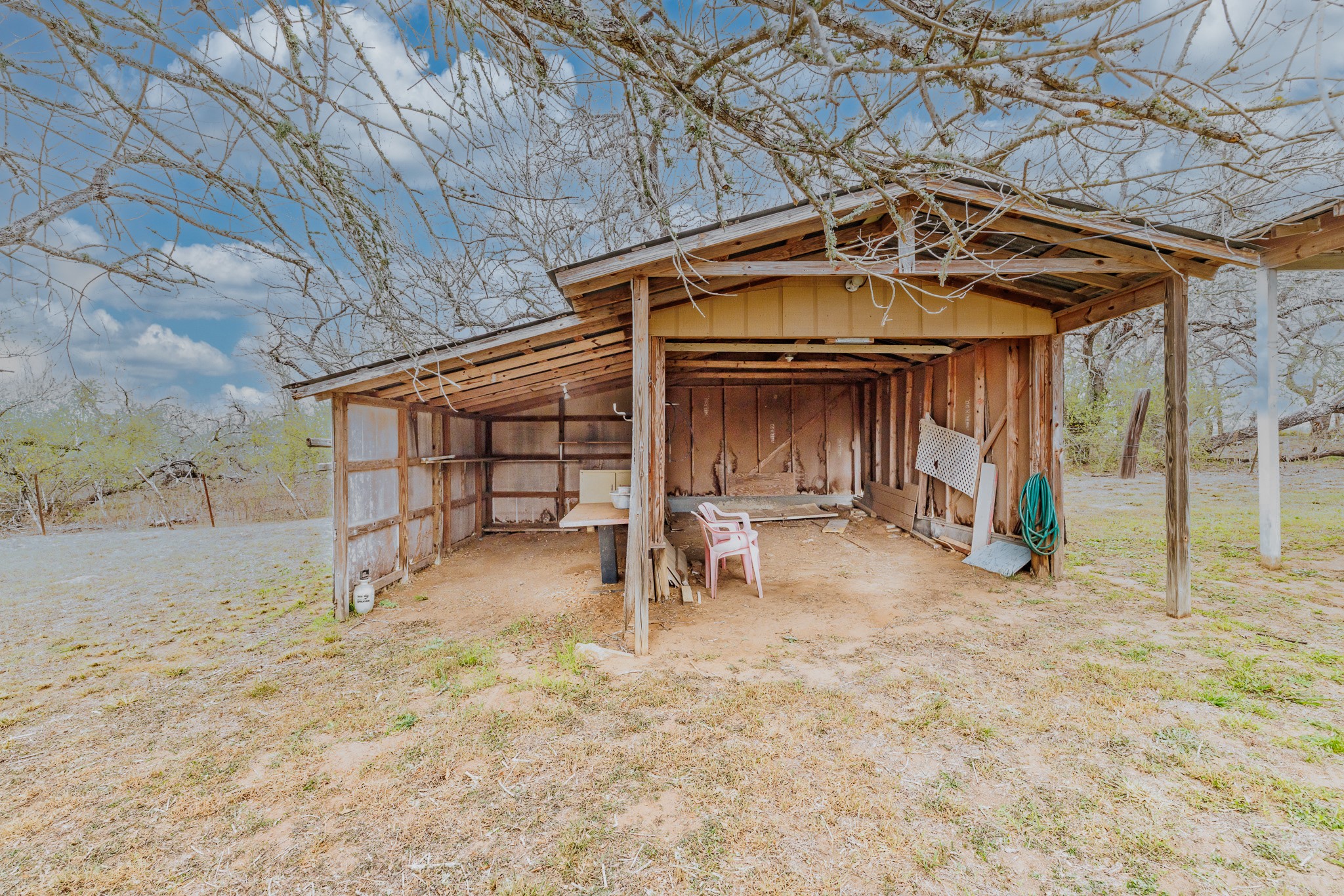 406 Carpenter Street Smiley, TX 78159 - Photo 9 of 17 a view of a big room with table and chairs