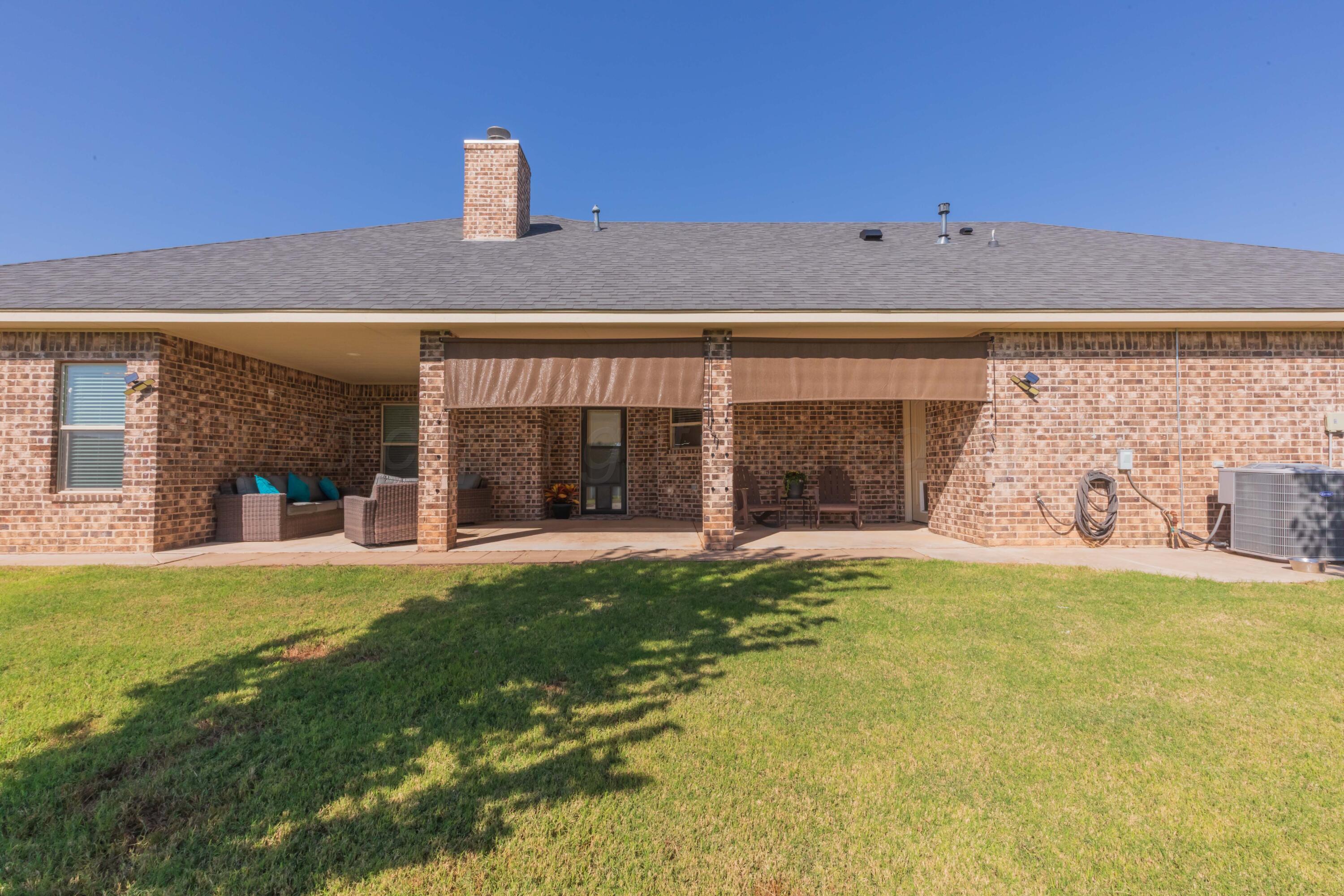 9801 Yesterday Amarillo, TX 79119 - Photo 17 of 54 a view of an house with backyard porch and outdoor space