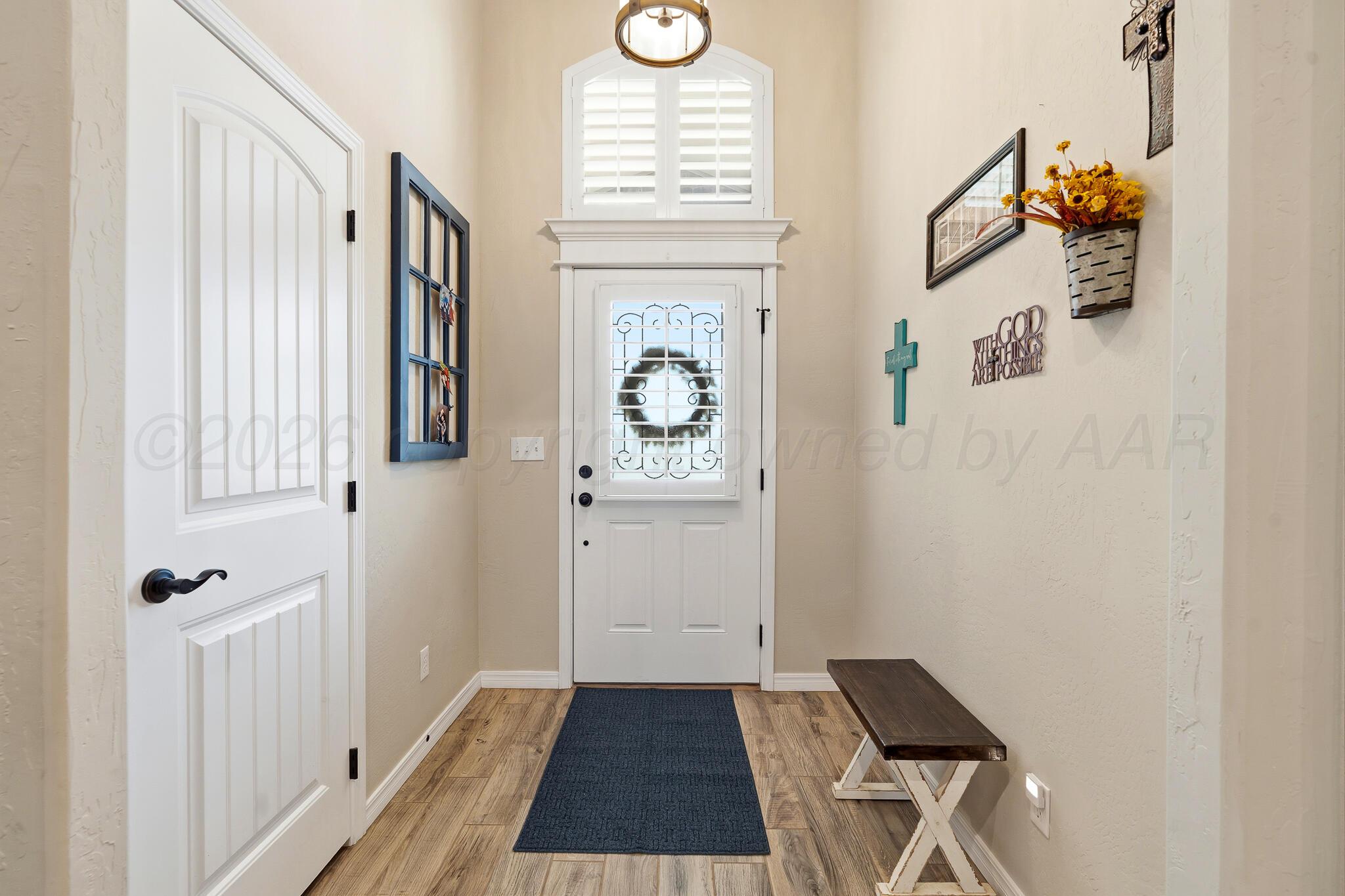 9801 Yesterday Amarillo, TX 79119 - Photo 19 of 54 a view of entryway with wooden floor