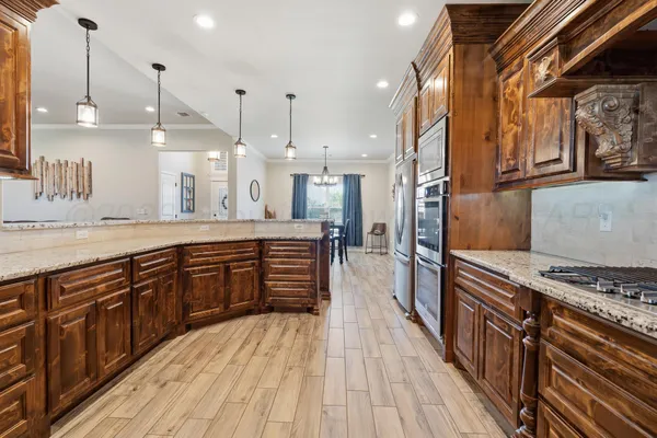a view of living room with furniture and flat screen tv