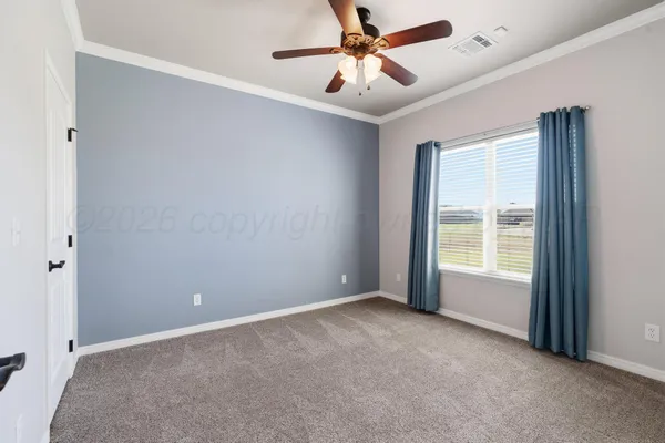 a view of a big yard next to a yard