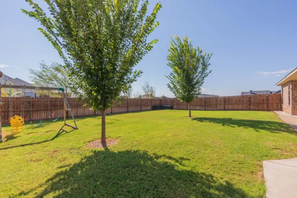 an aerial view of a house with a ocean view
