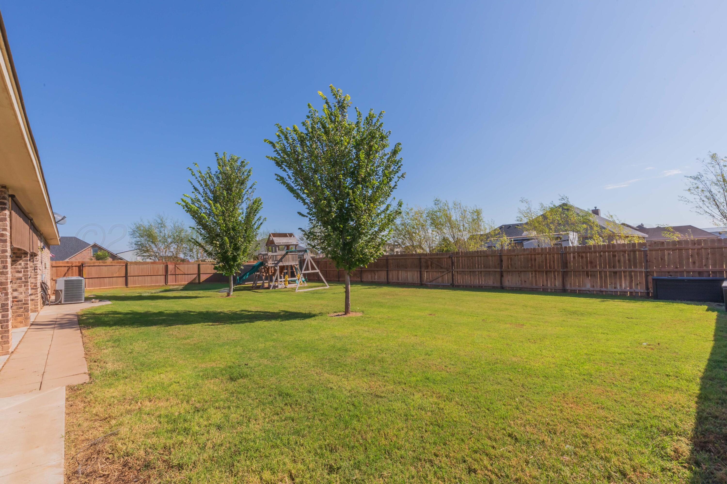 9801 Yesterday Amarillo, TX 79119 - Photo 8 of 54 a view of outdoor space and yard